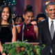 Malia Obama, Sasha Obama and their dad, President Barack Obama
Getty